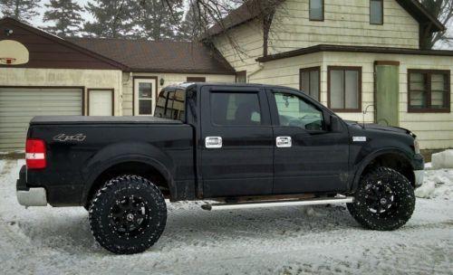lifted 2004 Ford F 150 crew cab