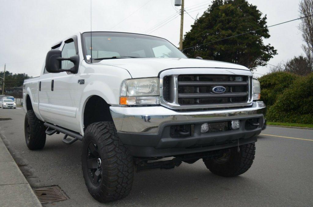 well equipped 2002 Ford F 350 Lariat crew cab