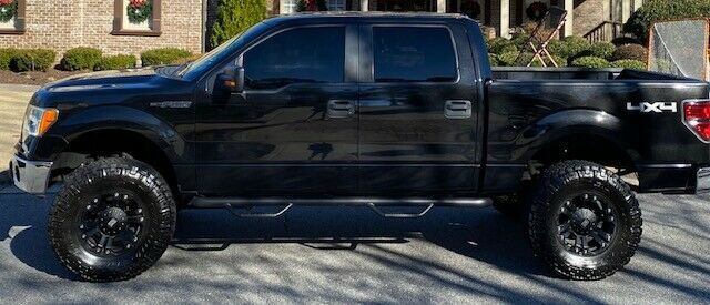 lifted 2010 Ford F 150 XLT crew cab