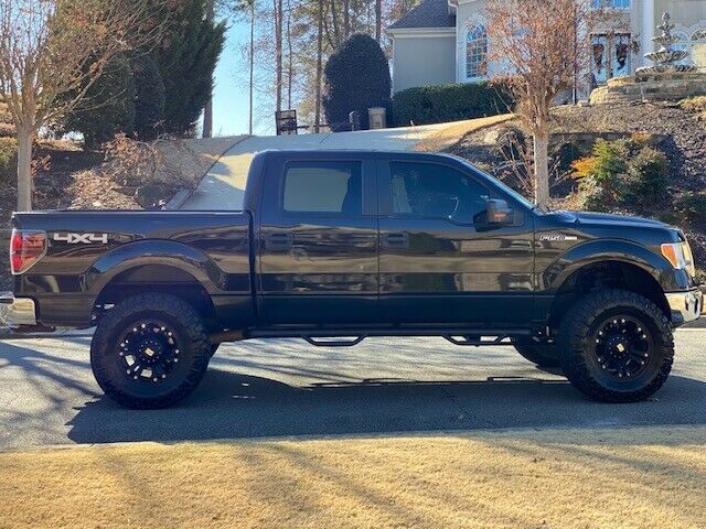 lifted 2010 Ford F 150 XLT crew cab